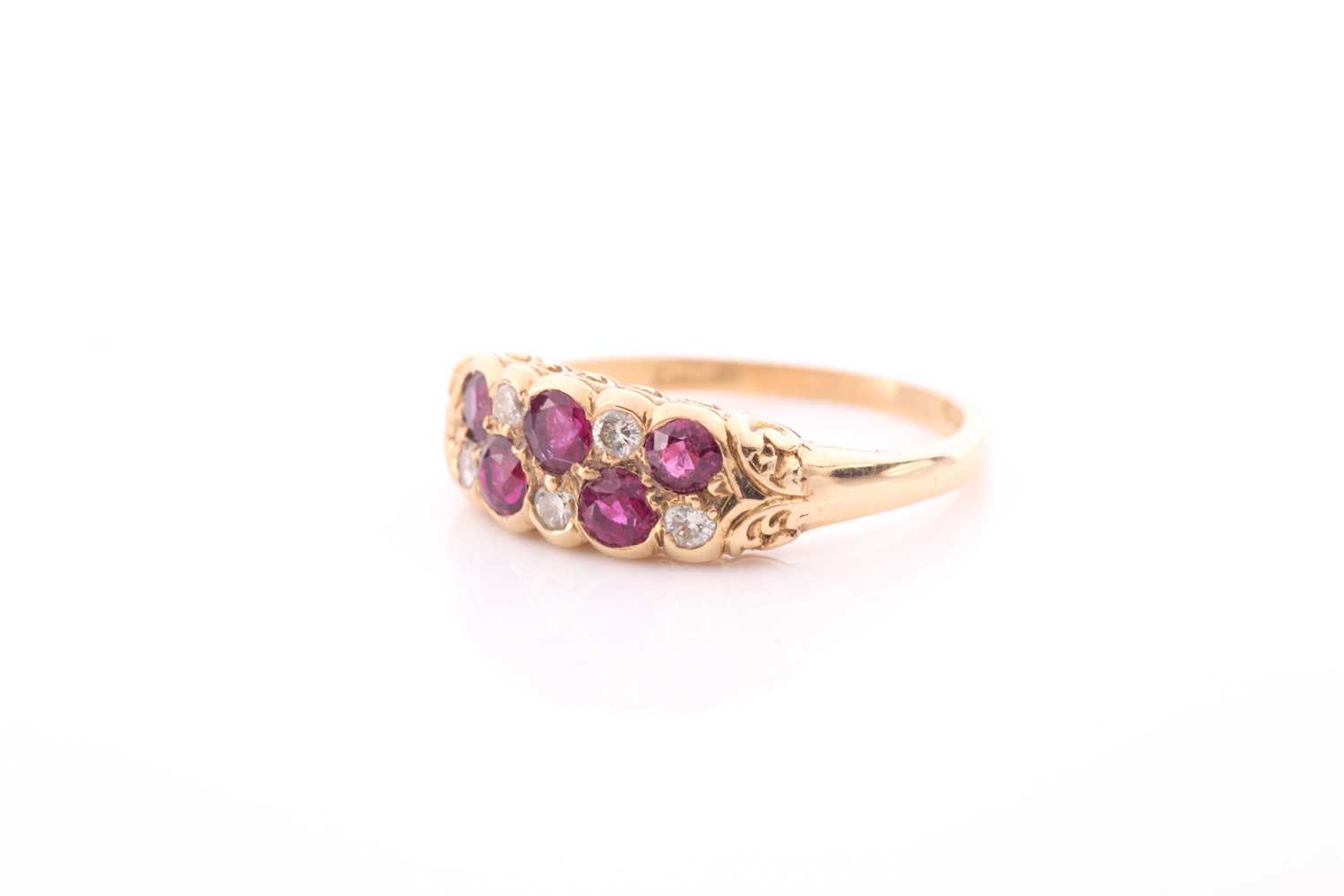 An 18ct yellow gold, diamond, and ruby ring, rubover set with mixed round-cut rubies and old-cut - Image 3 of 4