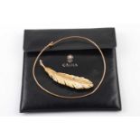 Andrew Grima. An 18ct yellow gold pendant necklace, in the form of a naturalistic feather inset with