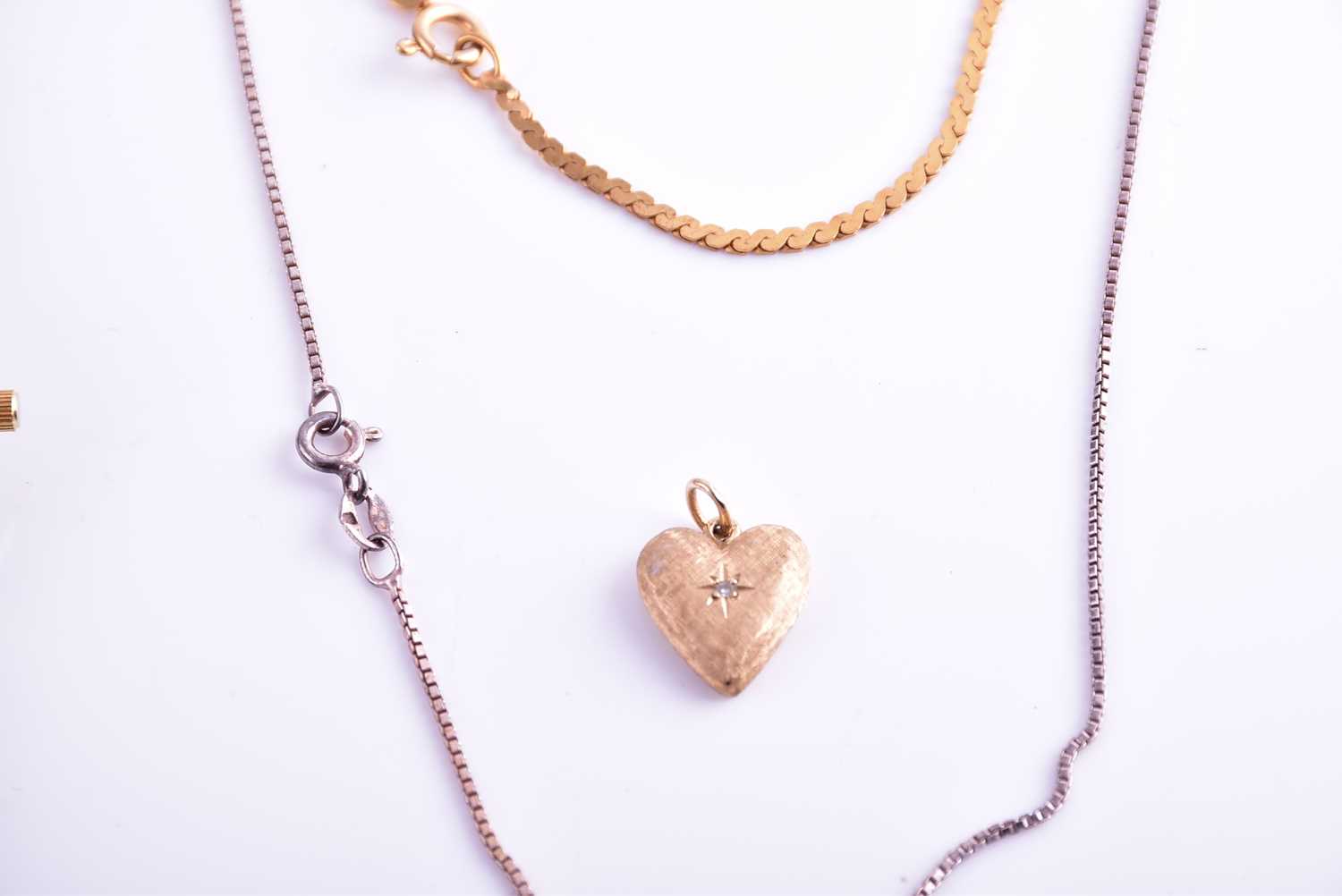 A yellow metal heart-shaped pendant, together with a silver chain and pendant, a 14ct yellow gold - Image 5 of 5