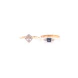 A three stone half hoop sapphire and diamond ring; the square cut sapphire in rubover mount, with