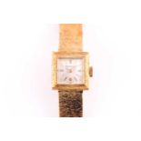 A Jaegar le Coultre ladies watch, the square white dial with baton markers, on a textured