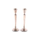 A pair of 20th-century silver table candlesticks. Birmingham 1972 by Sanders & Mackenzie. With tulip