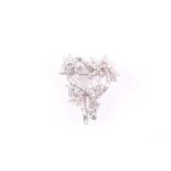 A white metal and diamond set stylised heart-shaped pendant / brooch, set with round, marquise,