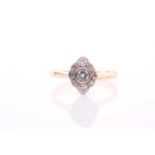 An 18ct yellow gold and diamond cluster ring, marquise-shaped mount measuring approximately 10 x 8