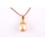 A yellow metal and South Sea pearl pendant necklace, set with a golden pearl, (the unmarked mount