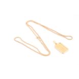 An 18ct yellow gold chain necklace, suspended with a fine gold ingot pendant, marked Credit