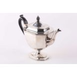 A silver teapot; London 1908 by Thomas Bradbury and Sons; octagonal with reeded borders and on a