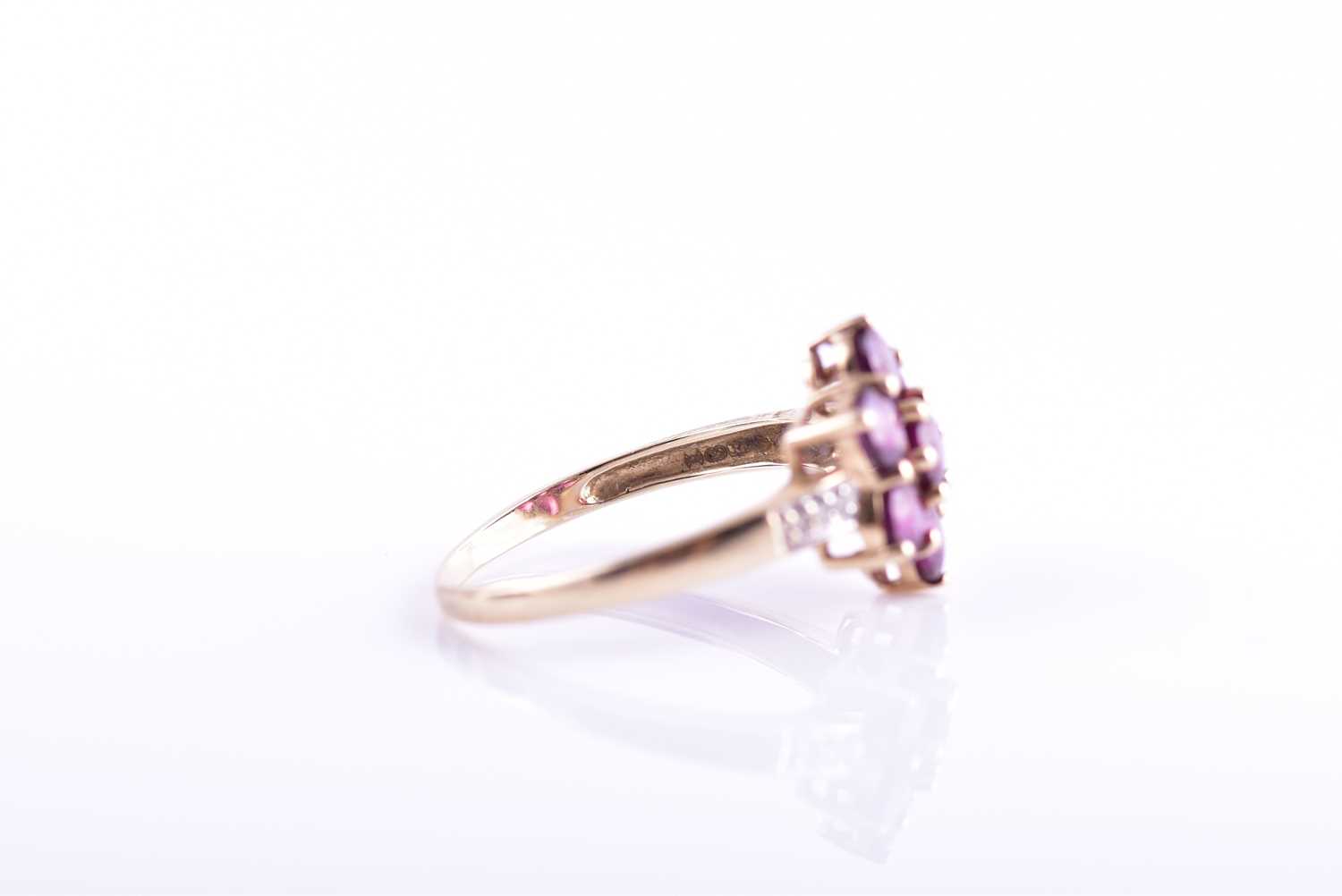 A 9ct yellow gold, diamond, and rhodalite garnet floral cluster ring set with seven round-cut - Image 4 of 4