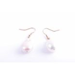 A pair of yellow metal and Baroque pearl drop earrings, the naturalistic white pearls with