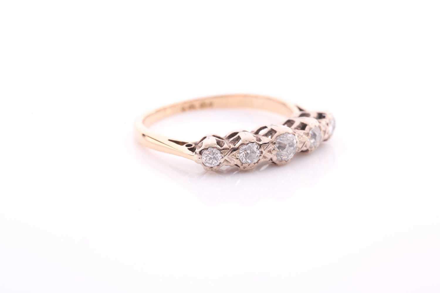 A five stone half hoop diamond ring; the graduated mixed old brilliant cut stones in carved claw - Image 3 of 4
