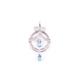 A diamond and blue topaz drop pendant, in the early 20th century style, with bow-shaped surmount,