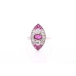 A diamond and ruby ring, the Art Deco style marquise-shaped mount set with round-cut diamonds and