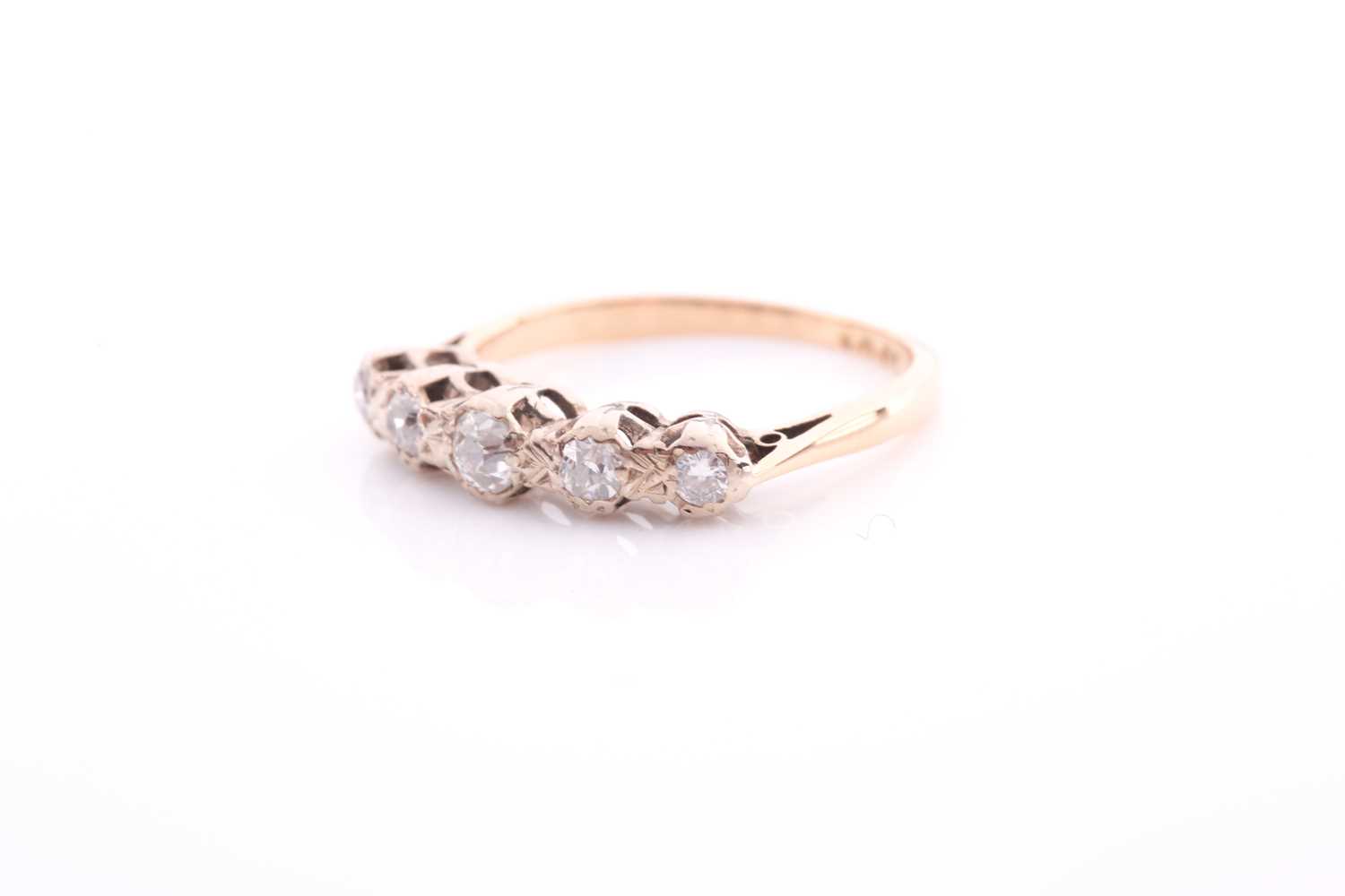 A five stone half hoop diamond ring; the graduated mixed old brilliant cut stones in carved claw - Image 2 of 4