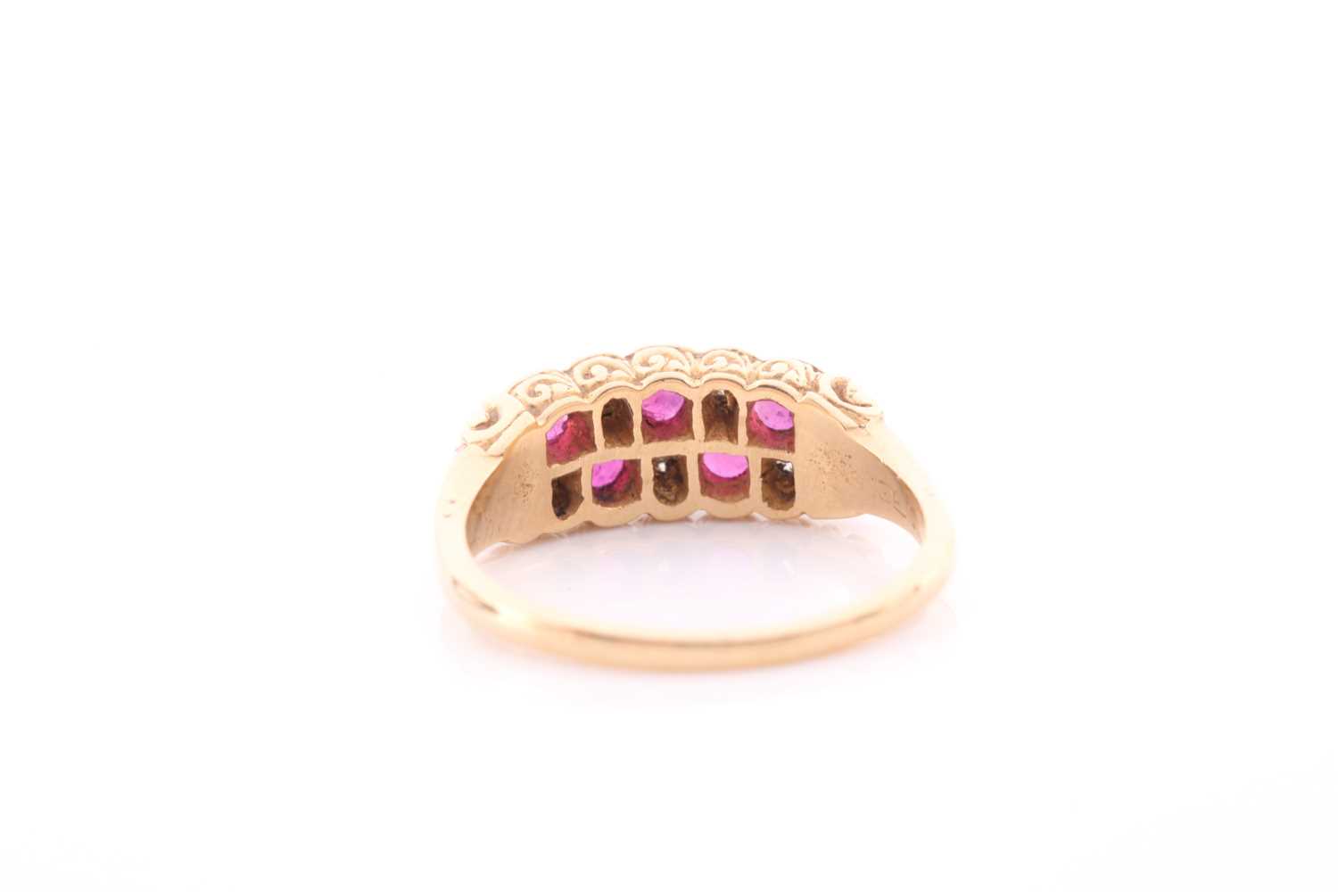 An 18ct yellow gold, diamond, and ruby ring, rubover set with mixed round-cut rubies and old-cut - Image 4 of 4