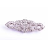 An early to mid 20th century diamond double clip brooch, inset with round-cut diamonds, in white