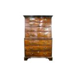 A George III mahogany chest on chest, the upper section with two short over three long drawers the