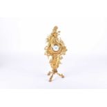 J. Watts of London No 2796. An 18th-century ormolu table clock' cast with rococo scrolls a young