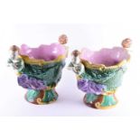 A pair of large and impressive majolica wine coolers, 19th century, in the manner of Minton, with