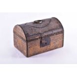 An early 19th-century dome-topped pony skin-covered table casket, with close nailed detail and