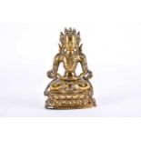 A Tibetan bronze figure of Tara, Seated in the dhyana mudra upon a double lotus socle. 11 cm wide