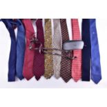 A collection of vintage designer ties, to include examples by Hermes, Dunhill, Aquascutum and