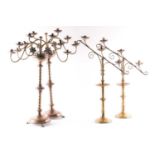 A pair ecclesiastical brass gothic candelabra in the manner of John Hardman of Birmingham. Each