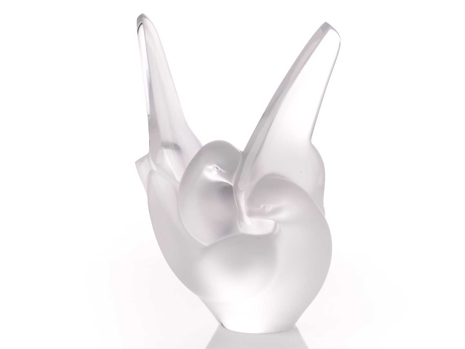 A Lalique art crystal "Sylvie" entwined dove vase. Bearing a Lalique factory label and an engraved