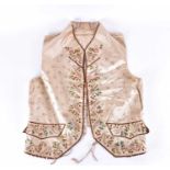 A late 18th century embroidered gentleman's ivory silk waistcoat. With flowers and stylized star