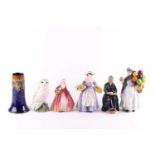 A small collection of Royal Doulton figures including "Cup of Tea" HN2322, "Daffy Down Dilly" HN1713