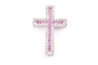 A diamond and pink sapphire cross pendant set with a central cross of square-cut sapphires within