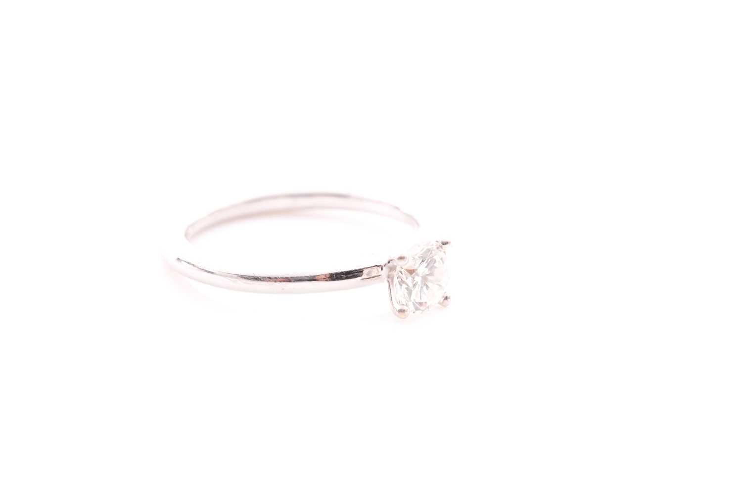 An 18ct white gold and solitaire diamond ring, set with a round brilliant-cut diamond, approximate - Image 2 of 5