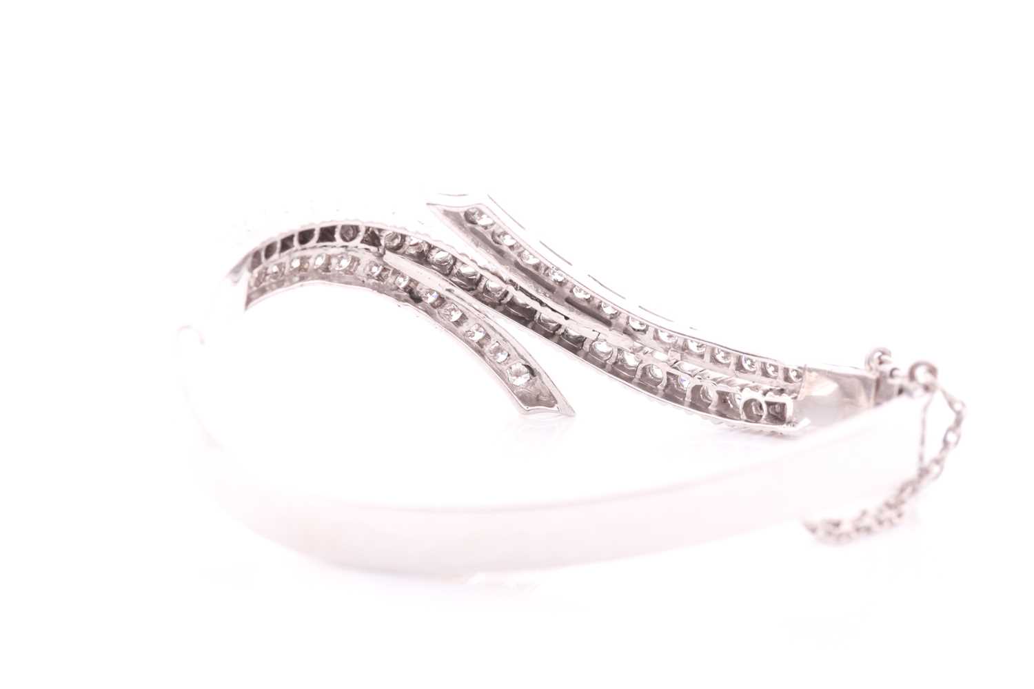 A diamond bangle of crossover design, inset with graduated round brilliant-cut diamonds of - Image 5 of 5