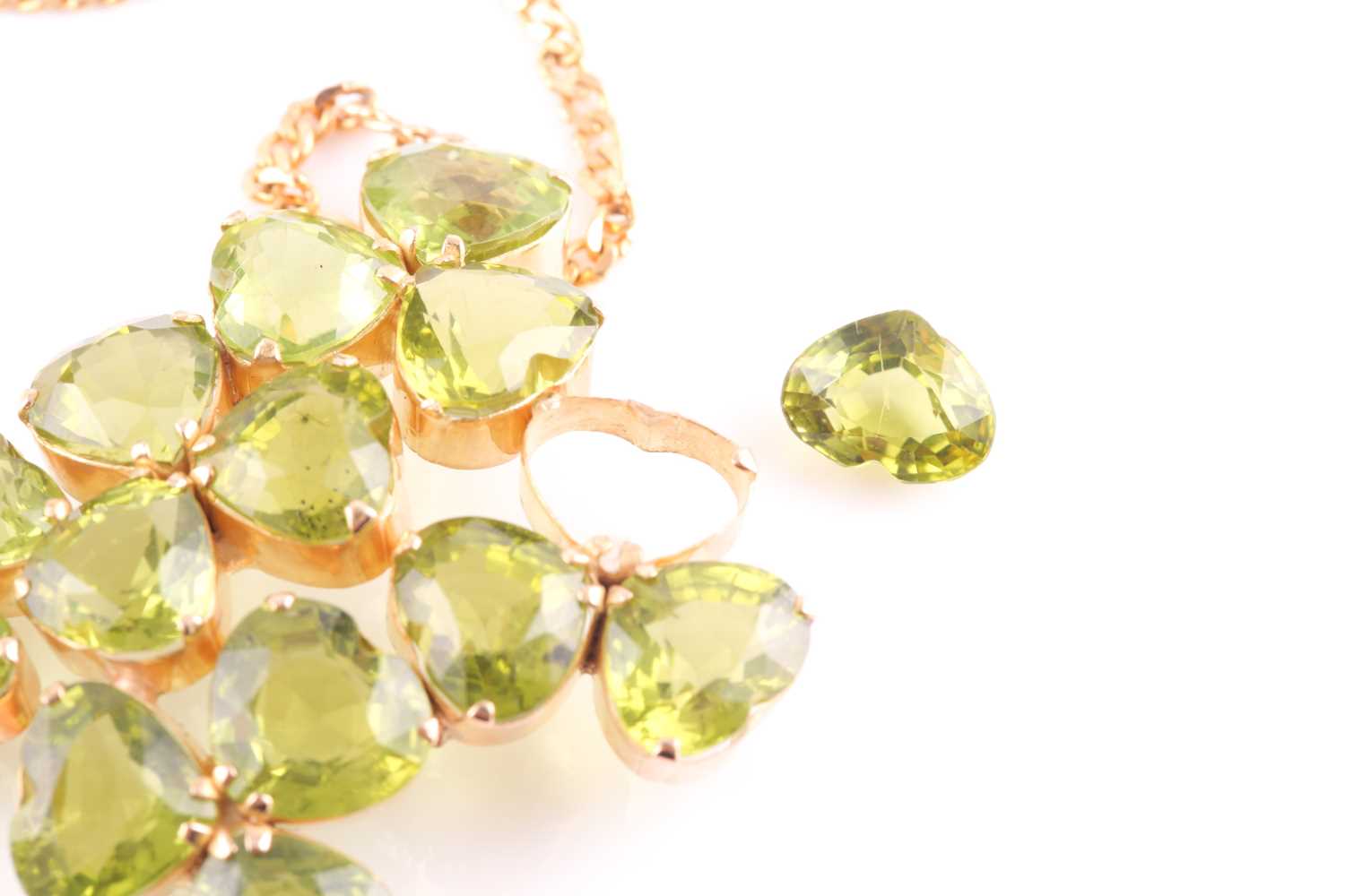 A peridot pendant; with centre composed of five three stone foliate clusters each set with the heart - Image 2 of 5