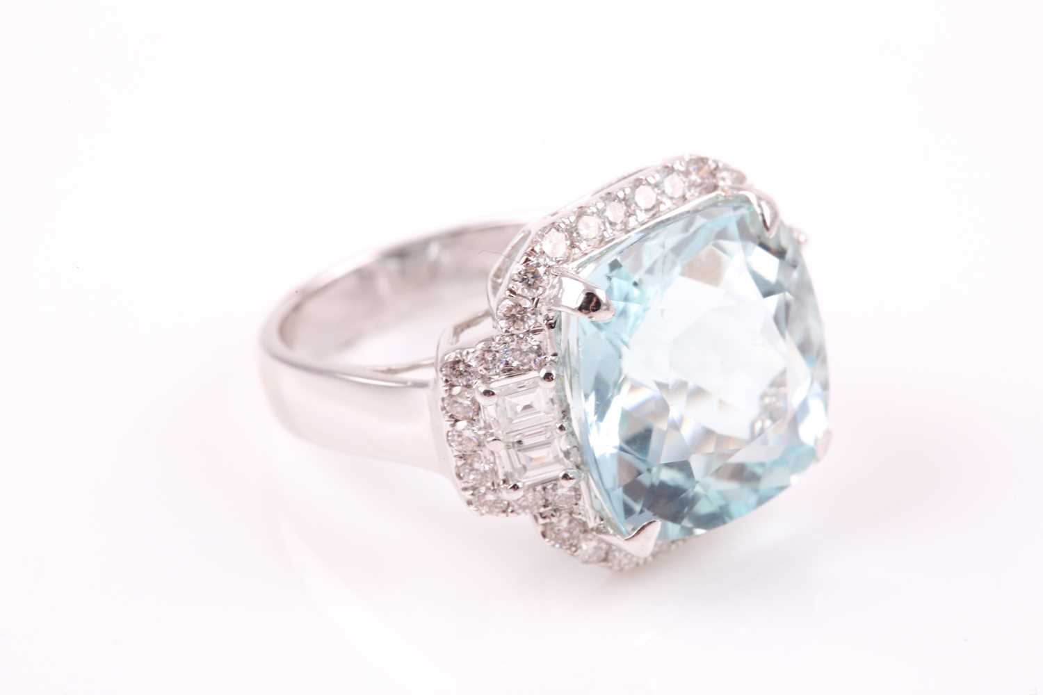 A diamond and aquamarine cocktail ring, set with a cushion-cut aquamarine of approximately 9.90 - Image 3 of 5
