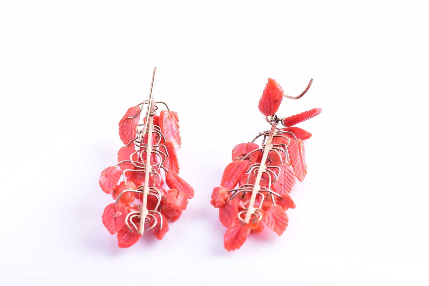 A pair of yellow metal and carved coral drop earrings, wire-set with foliate and floral carved red - Image 2 of 6