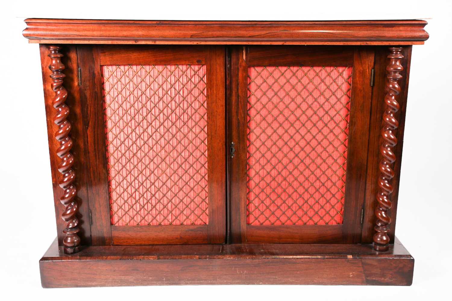 A Victorian marble-topped rosewood two-door chiffonier, with ogee moulded and each door with silk