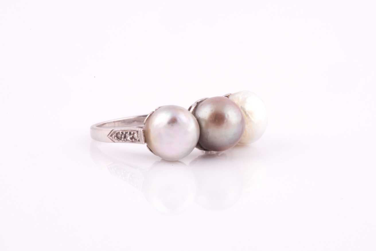 A pearl and diamond ring, set with three natural saltwater pearls, white, pale, and darker grey, the - Image 4 of 8