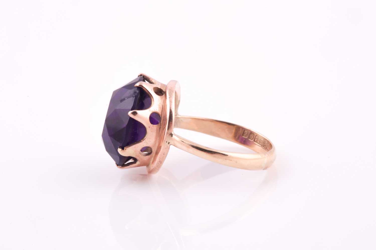 A 1960's amethyst solitaire ring, the round brilliant cut amethyst, approximately 10 carats, set - Image 2 of 5