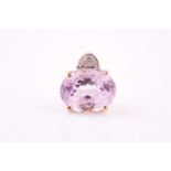 A 9ct yellow gold and kunzite pendant, set with a mixed oval cut lilac kunzite, measuring