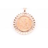A 9ct yellow gold mounted full sovereign pendant, the coin dated 1968, suspended on a 9ct yellow