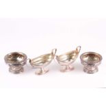 A matched pair of 19th century silver salts, London 1824 and 1834, various makers, with foliate