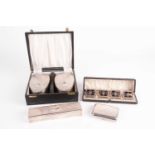 A presentation cased set of four 1920s silver and tortoiseshell menu holders. London 1920 by Charles