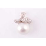 A South Sea pearl and diamond pendant, the white metal mount pave set with brilliant cut diamonds