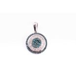 A 9ct white gold and diamond pendant, the circular mount inset with a cluster of round-cut blue
