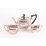 An Edwardian three-piece silver tea set. Sheffield 1902 (and other dates) by Mark Willis. With