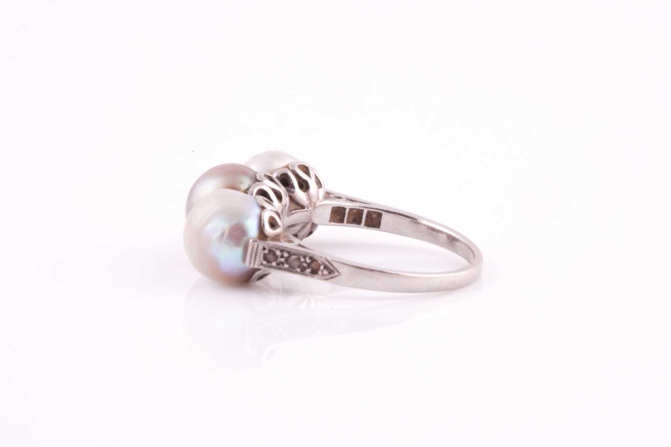 A pearl and diamond ring, set with three natural saltwater pearls, white, pale, and darker grey, the - Image 2 of 8