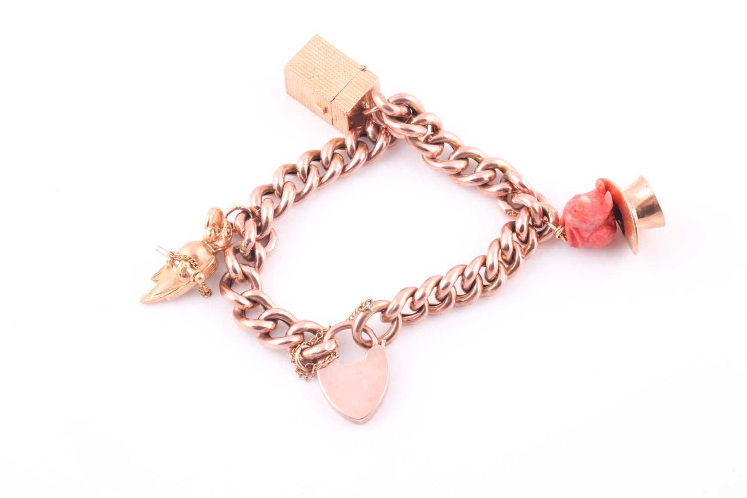 A 9ct rose gold curb-lik charm bracelet, with heart-shaped locket clasp, suspended with a yellow - Image 3 of 3