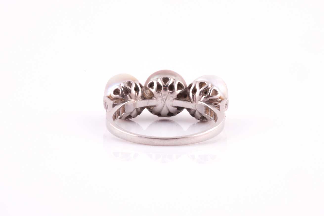 A pearl and diamond ring, set with three natural saltwater pearls, white, pale, and darker grey, the - Image 5 of 8