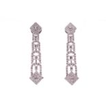 A pair of 18ct white gold and diamond articulated drop earrings, set with round and emerald-cut