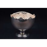 An Edwardian silver rose bowl, Birmingham 1908 by William Henry Sparrow, with repeating shell motifs